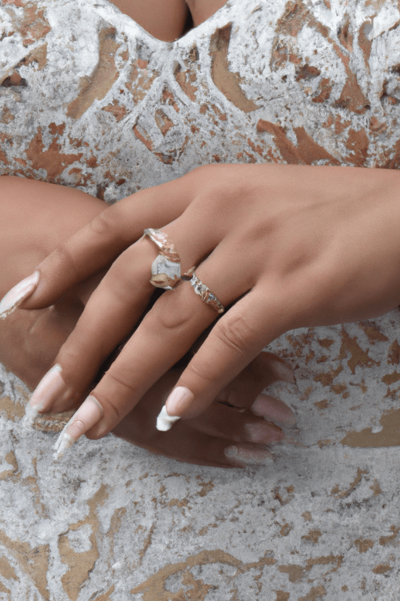 A bride showing off her wedding ring