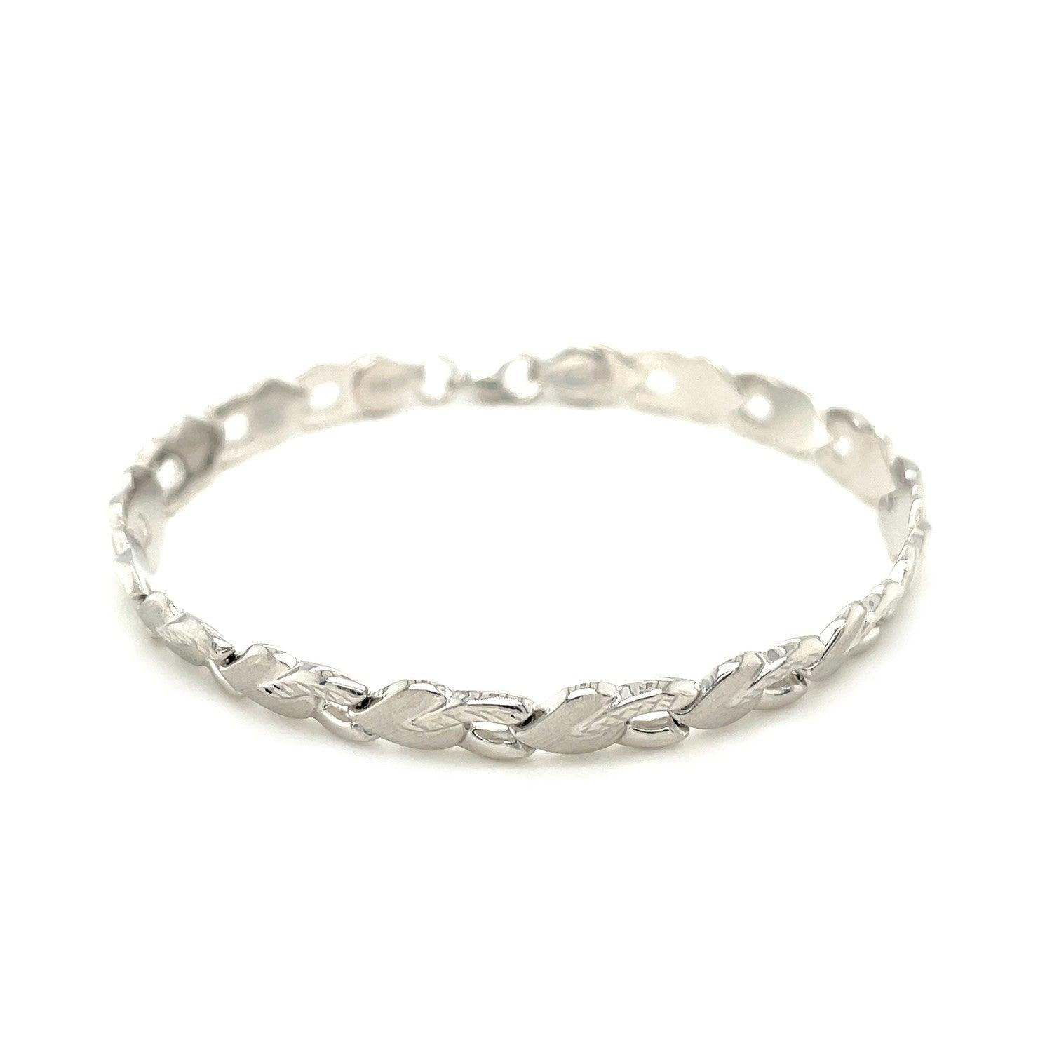 14k White Gold Heart Shape Textured Bracelet (6.35 mm)