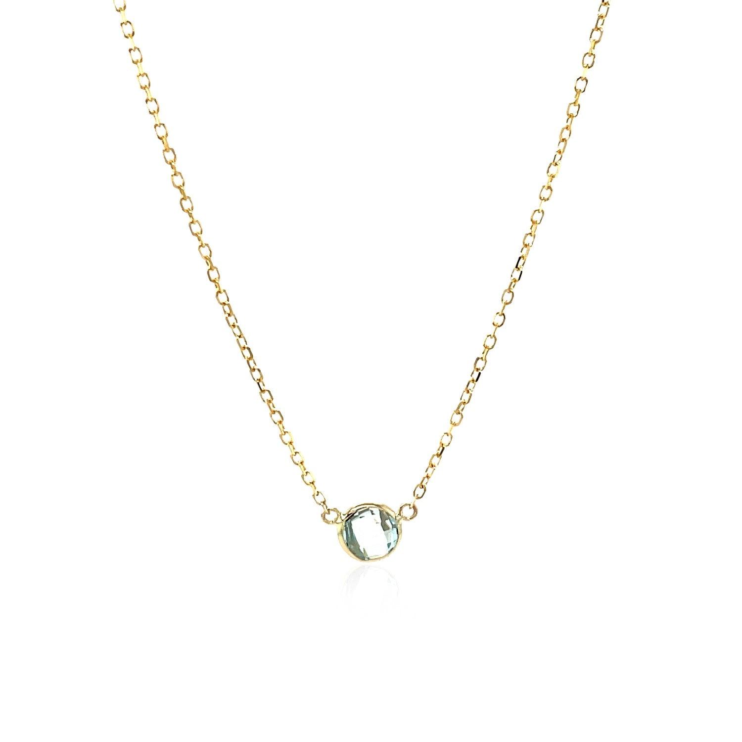 14k Yellow Gold 17 inch Necklace with Round Blue Topaz